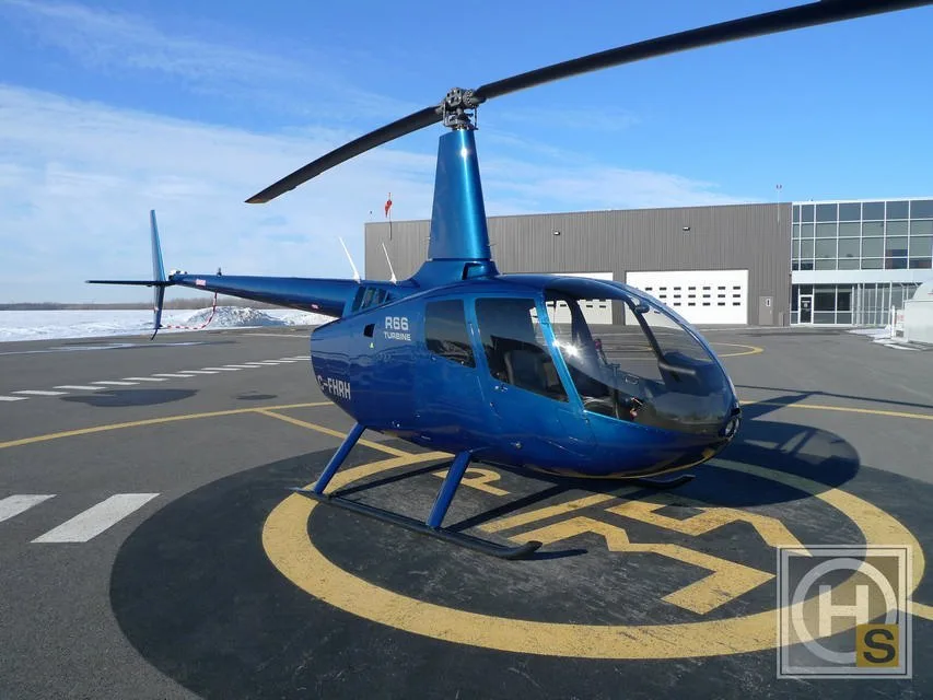 Exterior view of a 2008 Robinson R44 RAVEN I.