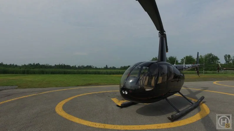 Exterior view of a 2009 Robinson R44 CLIPPER II.
