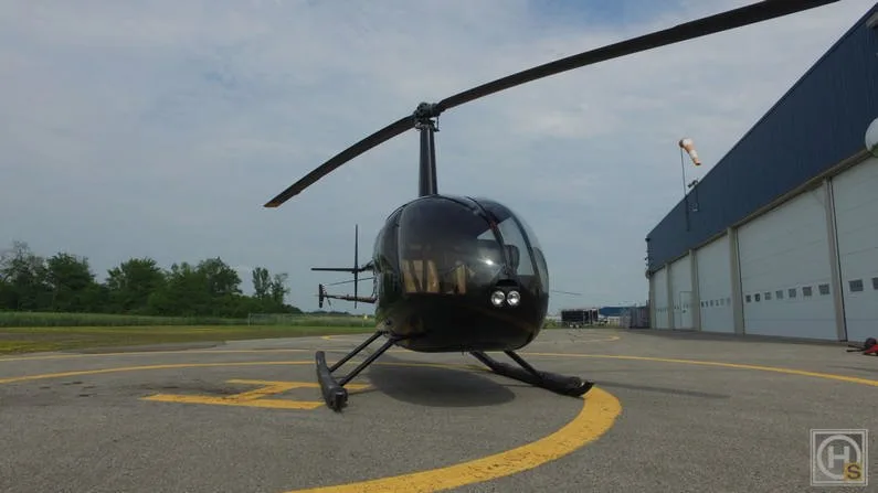 Exterior view of a 2009 Robinson R44 CLIPPER II.