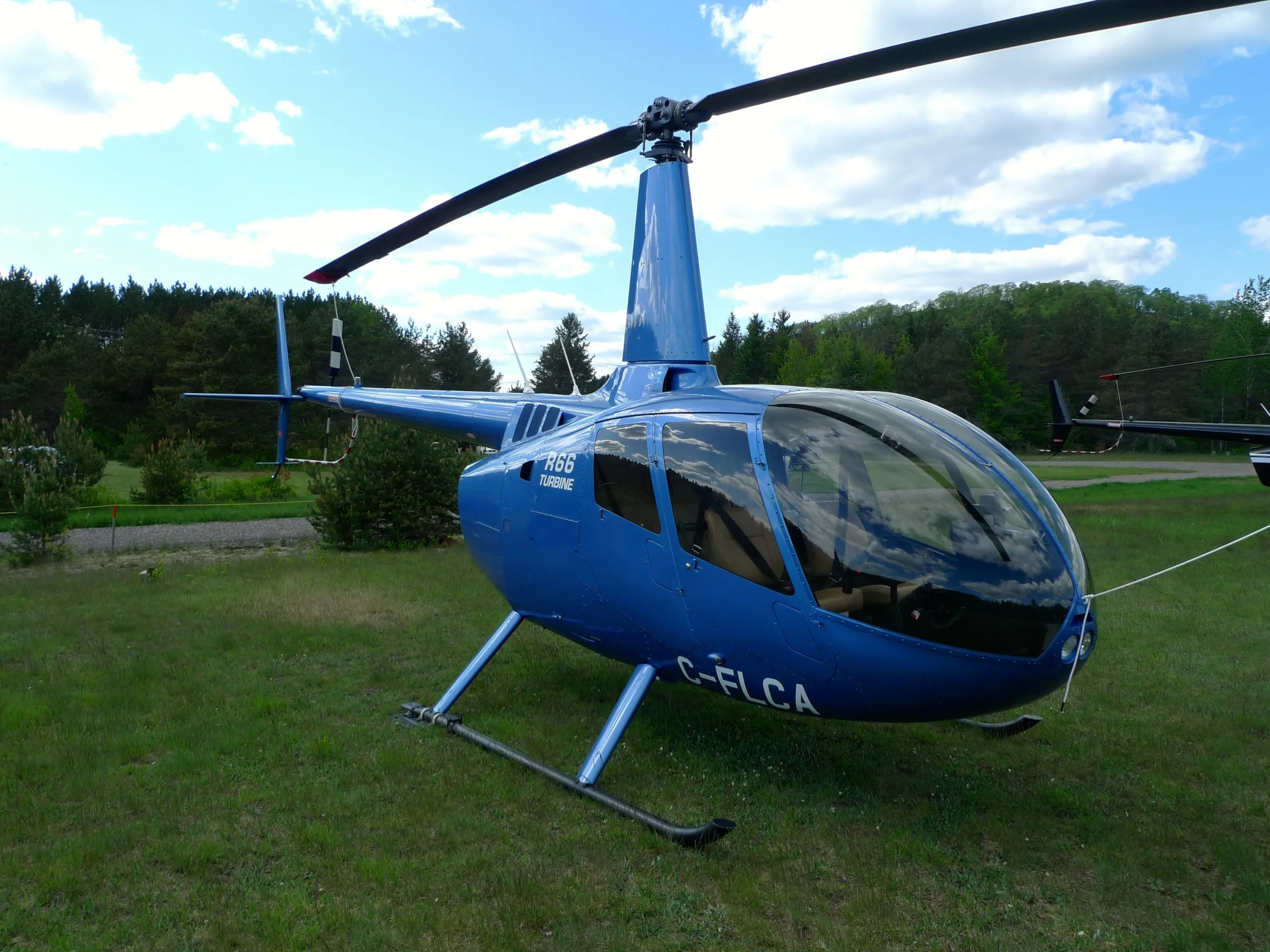 Exterior view of a 2011 Robinson R66.