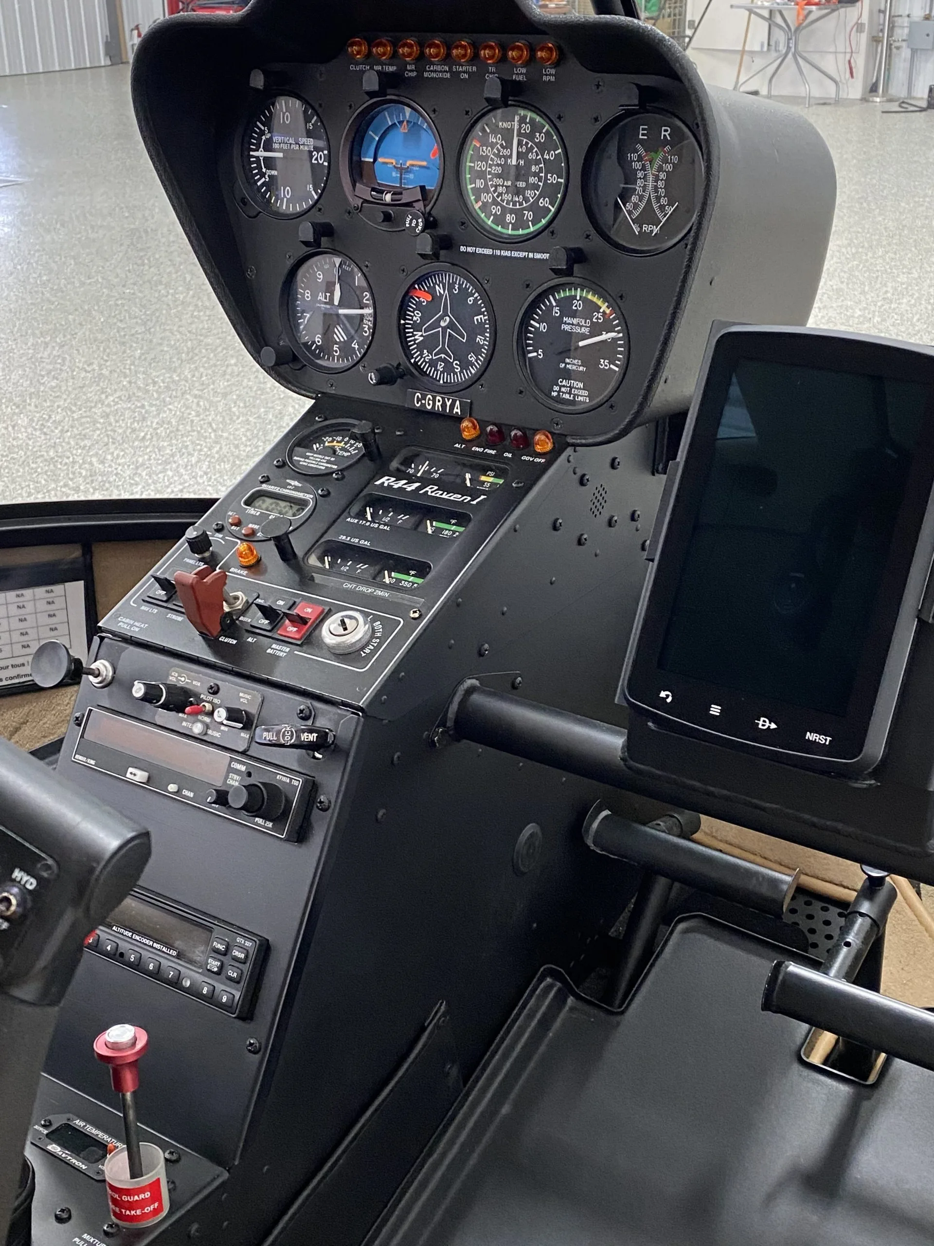 Cockpit and instrument panel of a 2012 Robinson R44.