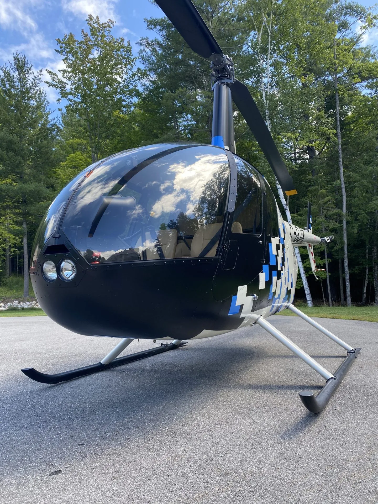 Marketing image of a 2012 Robinson R44 RAVEN II.