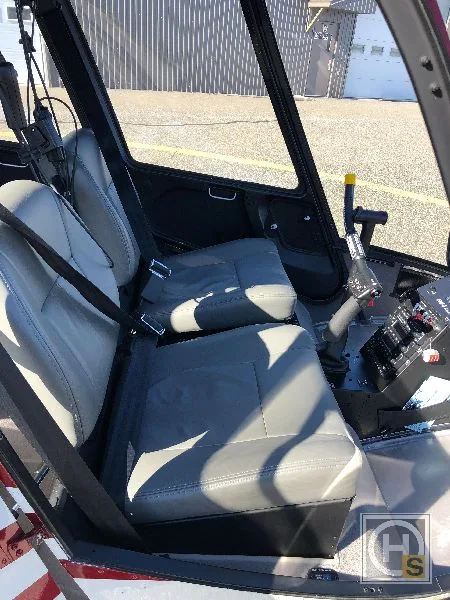 Cockpit and instrument panel of a 2015 Robinson R44 RAVEN II.