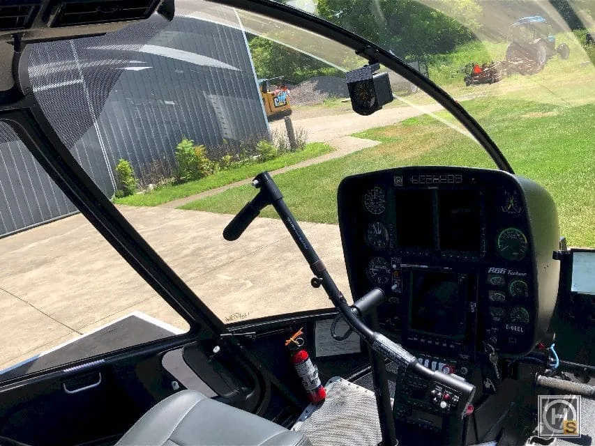 Cockpit and instrument panel of a 2018 Robinson R66 Turbine Marine.