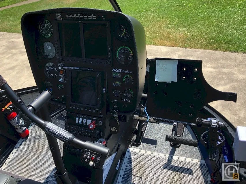 Cockpit and instrument panel of a 2018 Robinson R66 Turbine Marine.