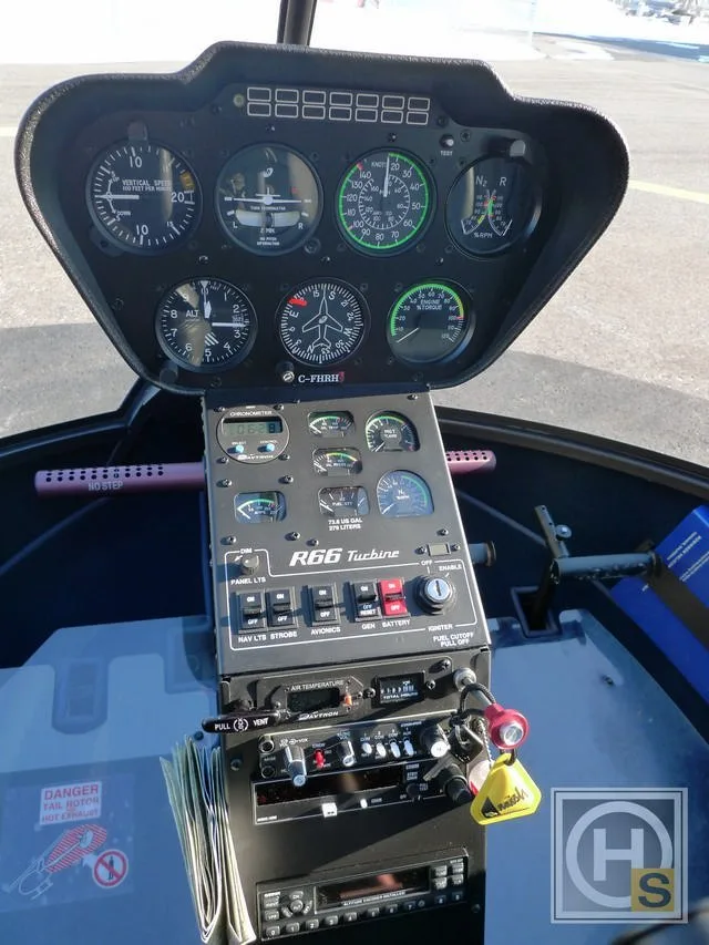 Cockpit and instrument panel of a 2012 Robinson R66 TURBINE.