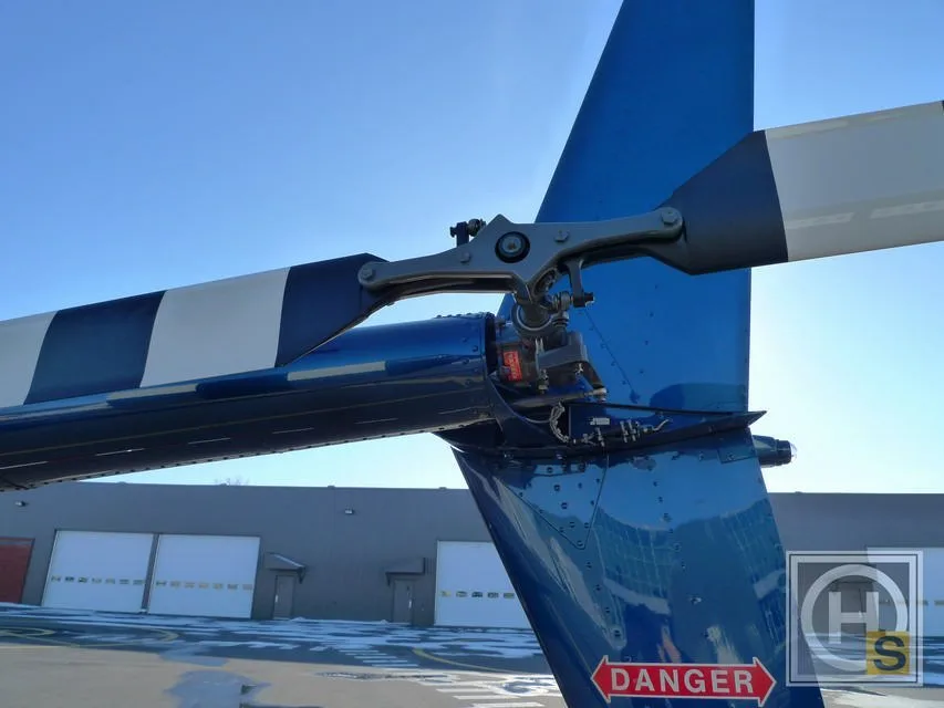 Exterior view of a 2012 Robinson R66 TURBINE.