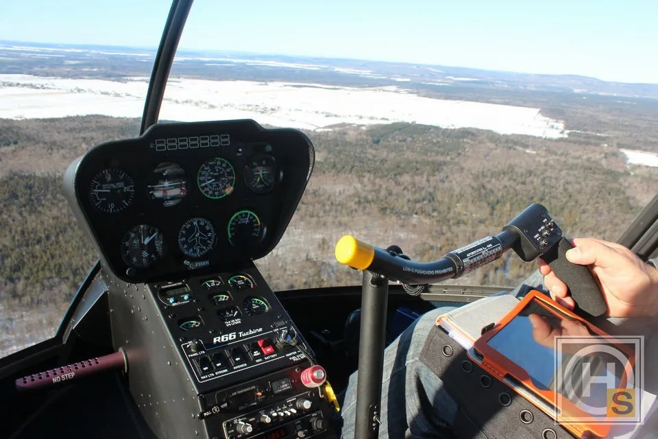 Cockpit and instrument panel of a 2012 Robinson R66 TURBINE.