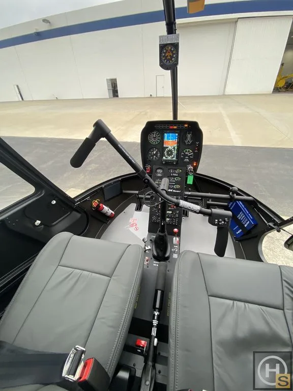 Cockpit and instrument panel of a 2022 Robinson R44 Raven I - August 2022.