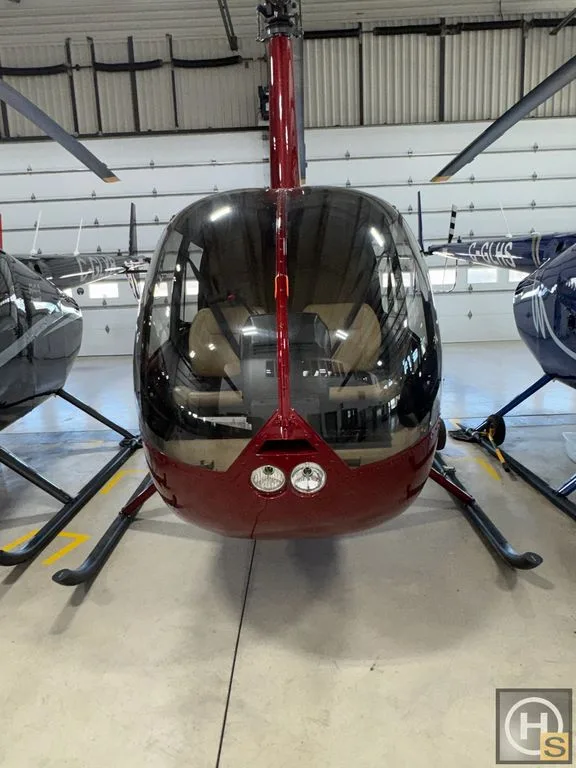 Exterior view of a 2015 Robinson R44 Raven I – June 2015 –, C-GVHS.