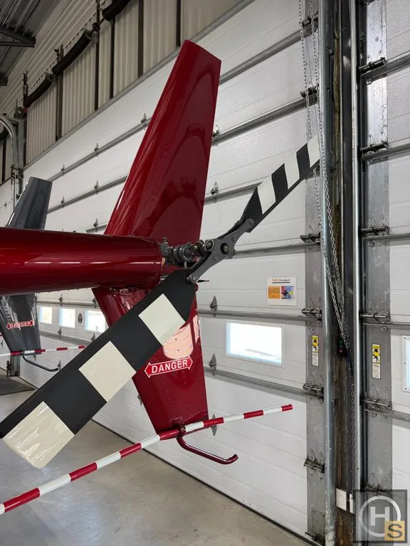 Exterior view of a 2015 Robinson R44 Raven I – June 2015 –, C-GVHS.