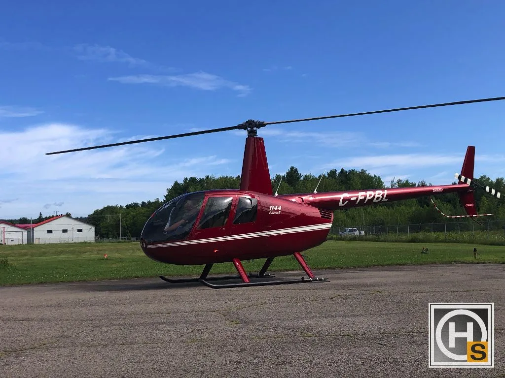 Marketing image of a 2012 Robinson R44 RAVEN II 2012.