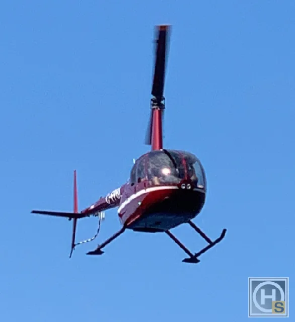 Marketing image of a 2012 Robinson R44 RAVEN II 2012.