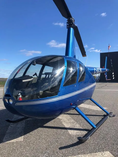 Exterior view of a 2018 Robinson R44 RAVEN II-OVERHAULED AUGUST 2018.