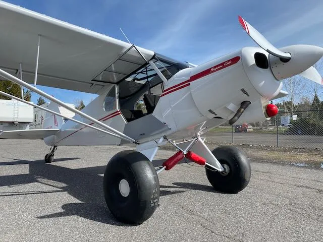 Exterior view of a 1955 Piper PA-18-150, N1662P.