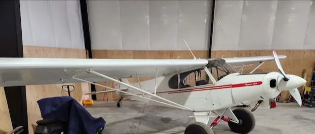 Exterior view of a 1955 Piper PA-18-150, N1662P.