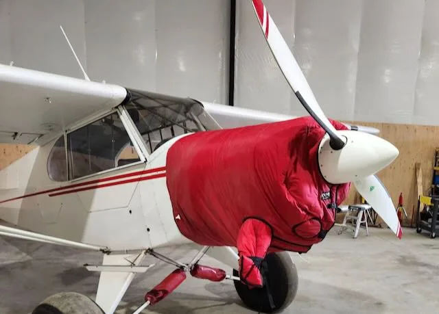 Exterior view of a 1955 Piper PA-18-150, N1662P.