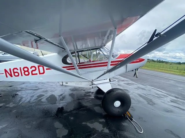 Exterior view of a 1957 Piper PA-18-150, N6182D.