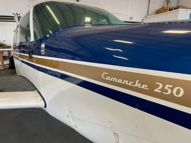 Exterior view of a 1959 Piper Comanche PA24-250, N6286P.