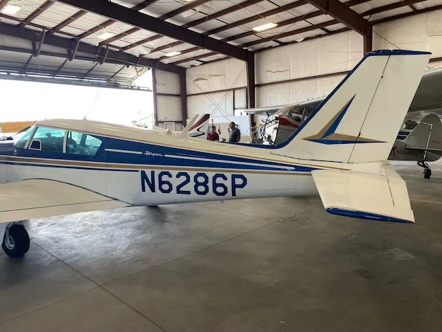 Exterior view of a 1959 Piper Comanche PA24-250, N6286P.
