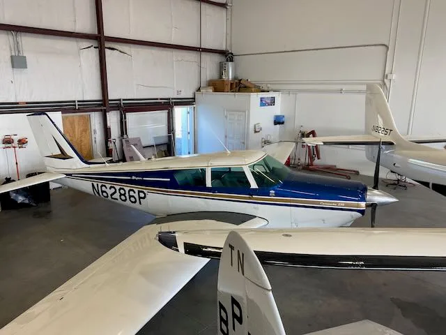 Exterior view of a 1959 Piper Comanche PA24-250, N6286P.