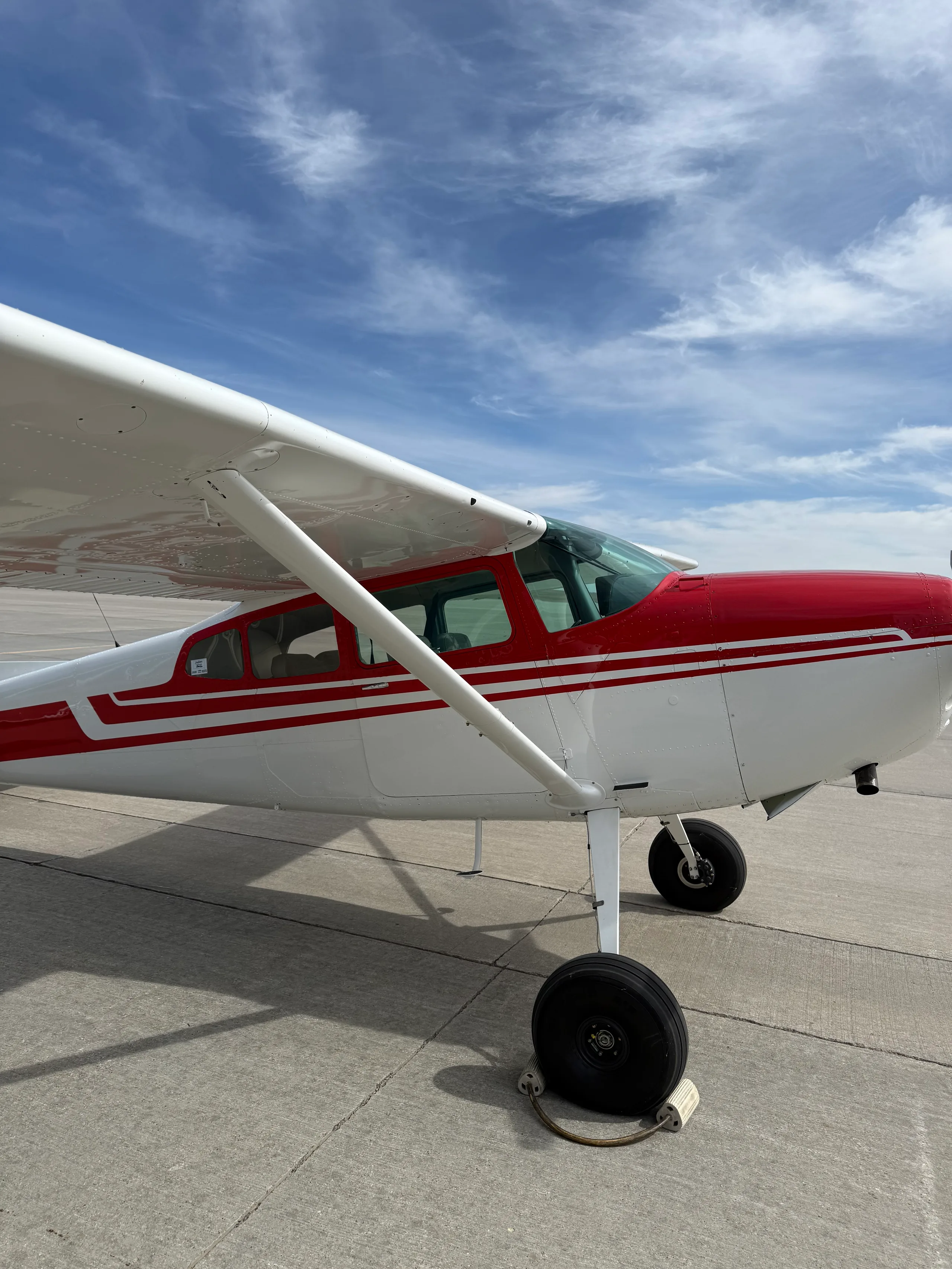 Exterior view of a 1973 Cessna 180J, N42100.