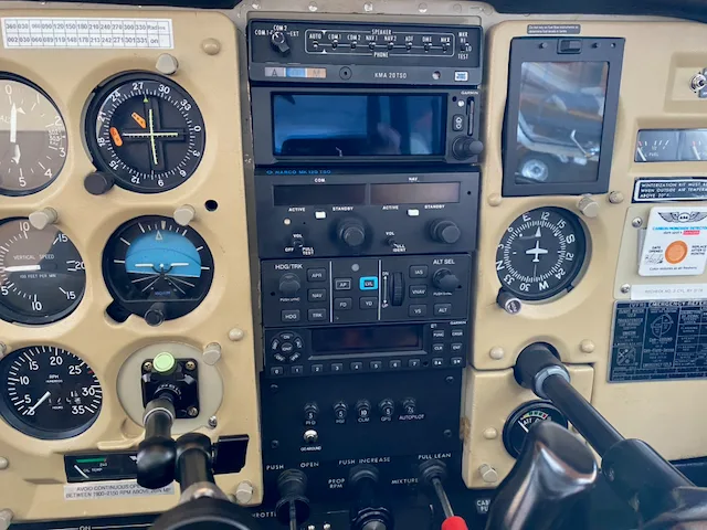 Cockpit and instrument panel of a 1977 Cessna 180K.