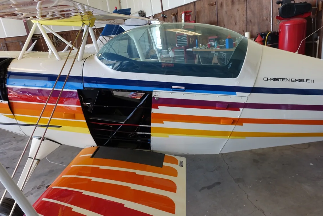Exterior view of a 1984 Aviat CHRISTEN EAGLE II, N99HL.