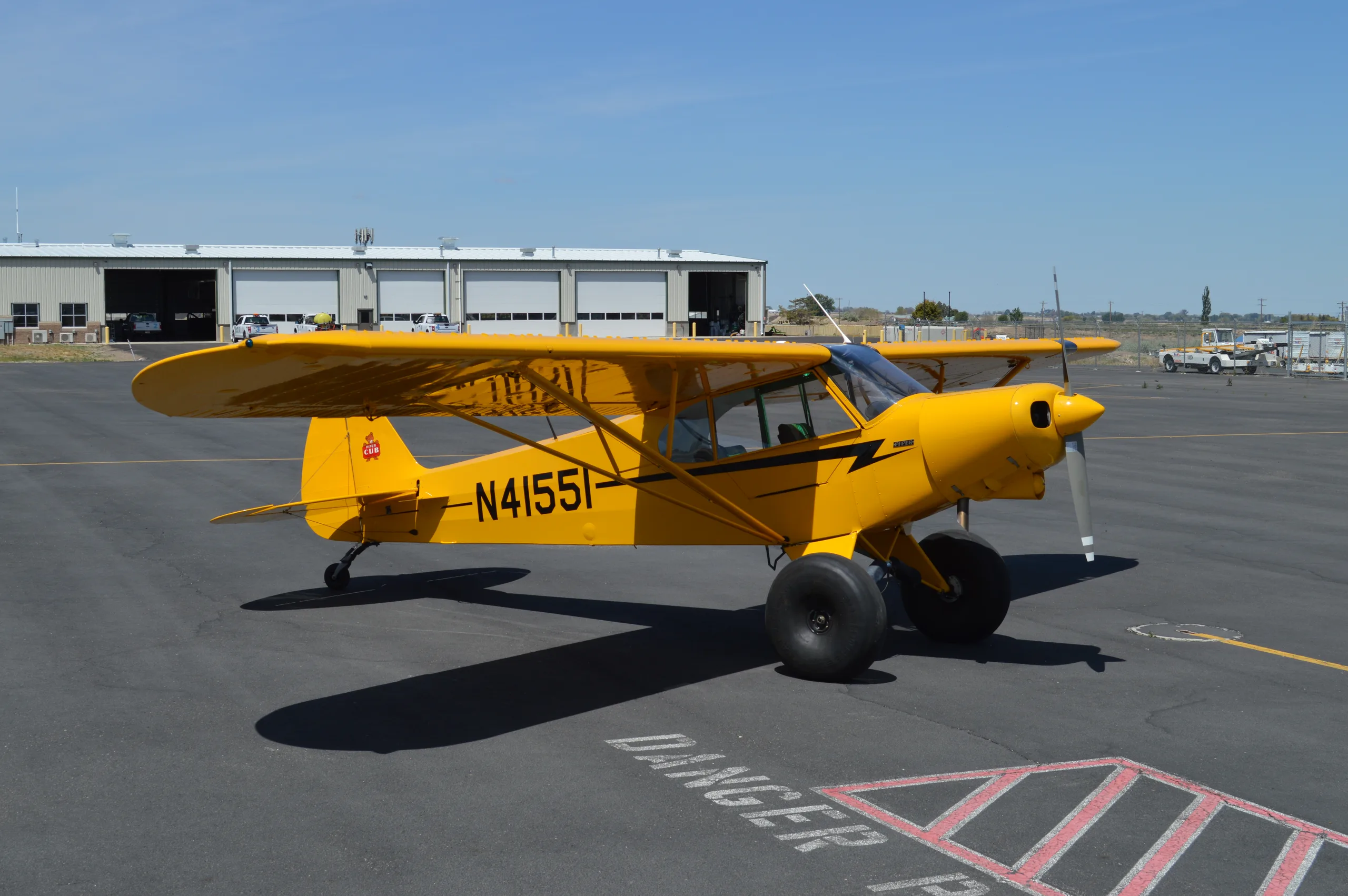 Exterior view of a 1993 Piper PA-18-150, N41551.