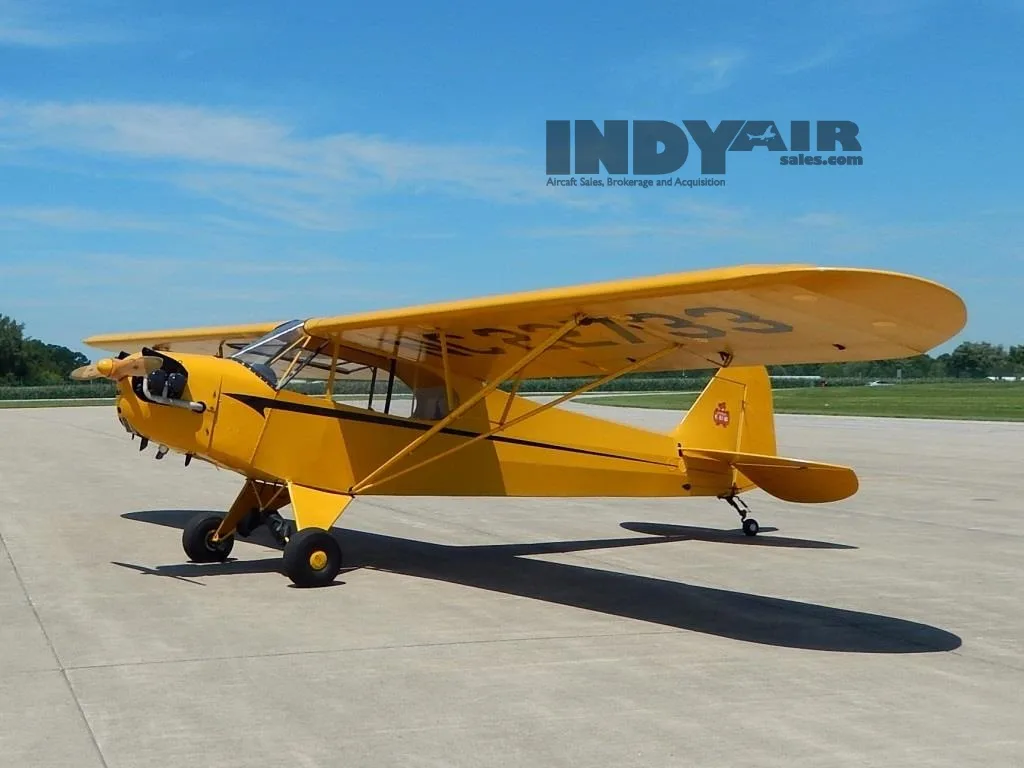 Exterior view of a 1938 Piper J3C Cub Sport- N22733 Aircraft.