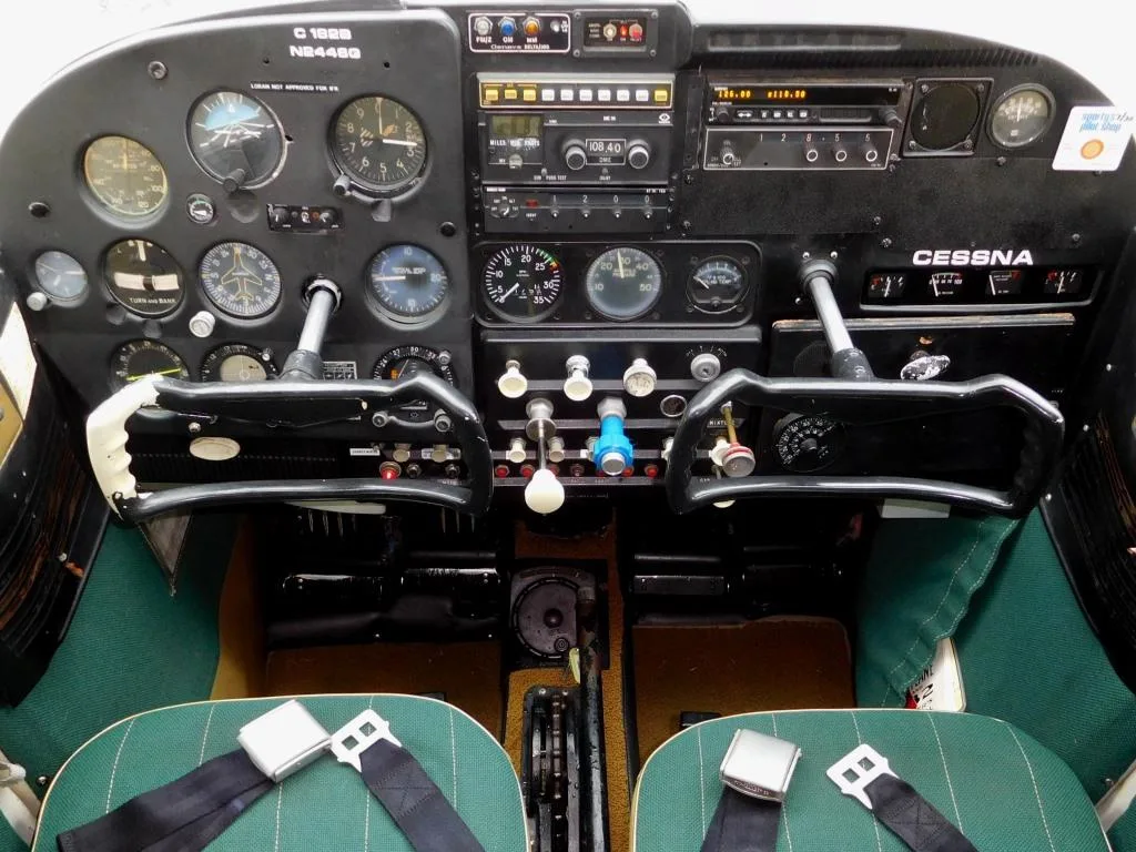 Cockpit and instrument panel of a 1959 Cessna 182-N2446G Aircraft.