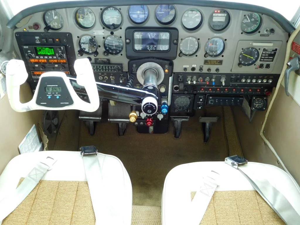 Cockpit and instrument panel of a 1960 Beechcraft Debonair - N869R Aircraft.