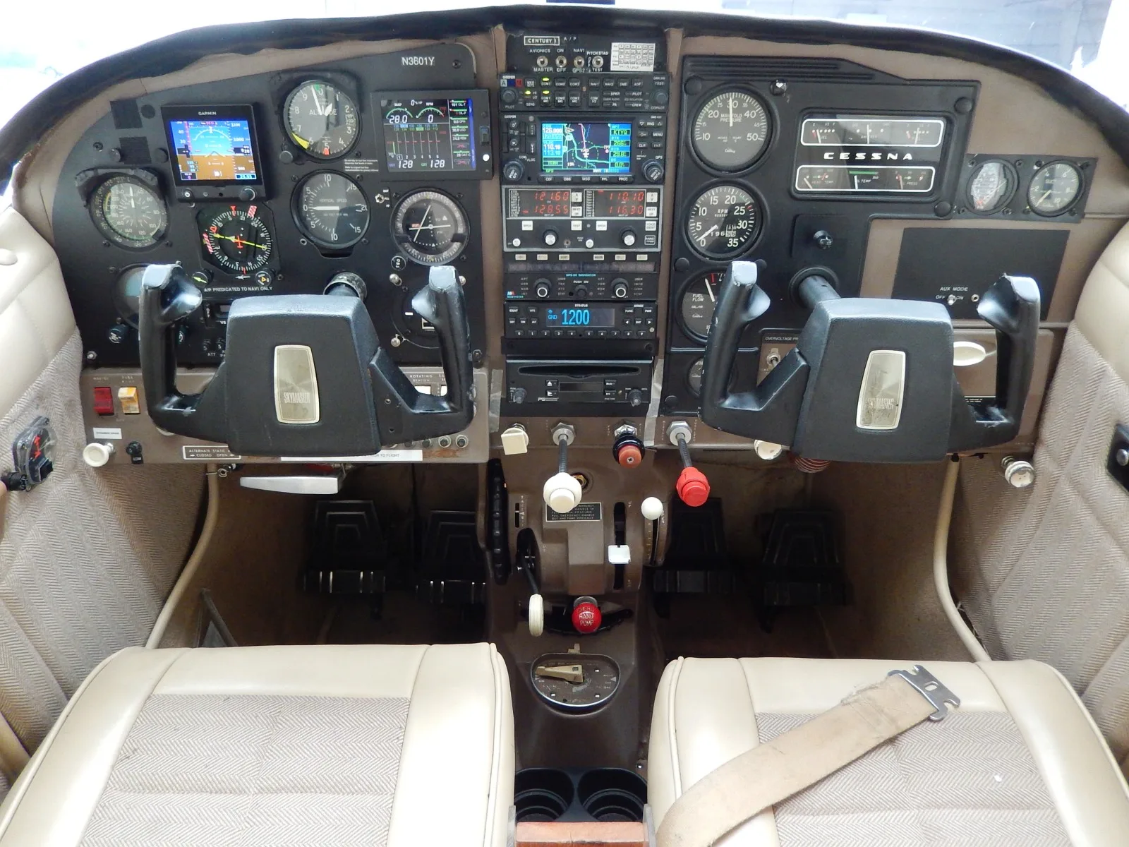 Cockpit and instrument panel of a 1963 Cessna 210 - N3601Y Aircraft.
