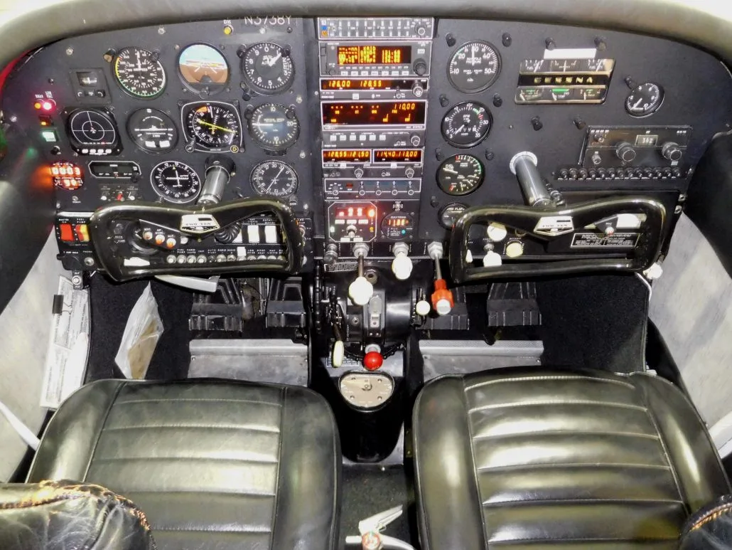 Cockpit and instrument panel of a 1964 Cessna 210D - N3738Y Aircraft.