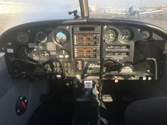 Cockpit and instrument panel of a 1964 Piper Cherokee 140 - N6513W Aircraft.