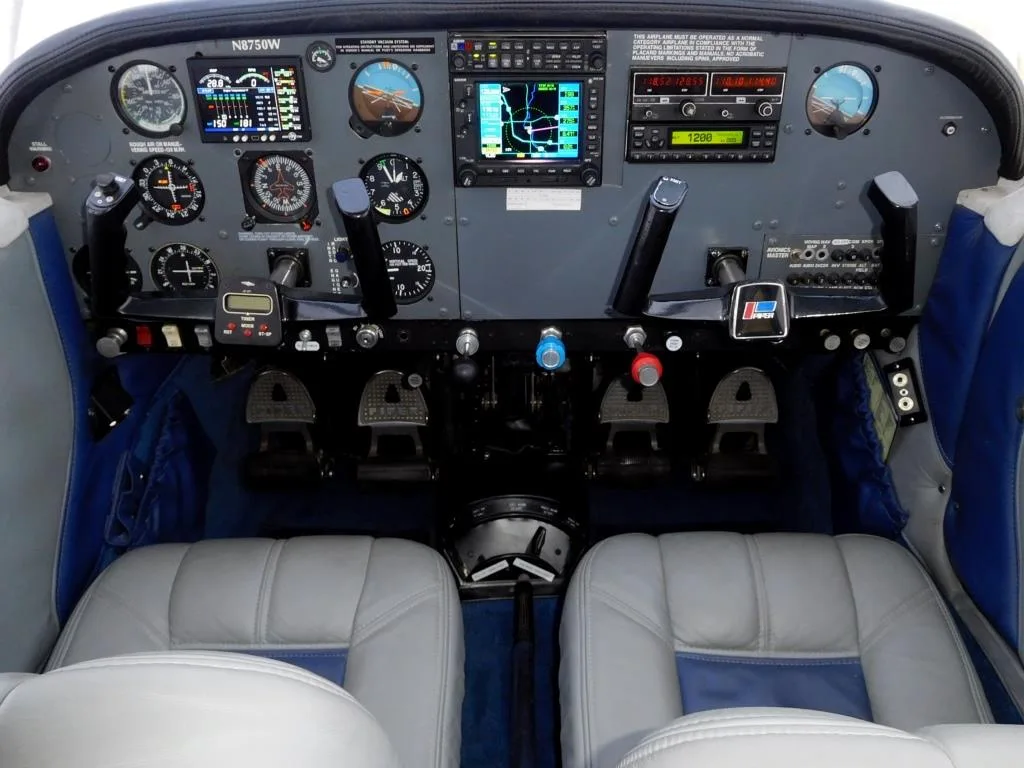 Cockpit and instrument panel of a 1964 Piper Cherokee 235 - N8750W Aircraft.