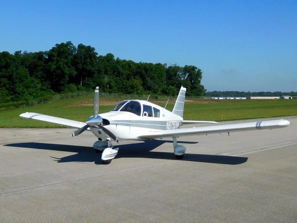 Exterior view of a 1964 Piper Cherokee 235 - N8750W Aircraft.