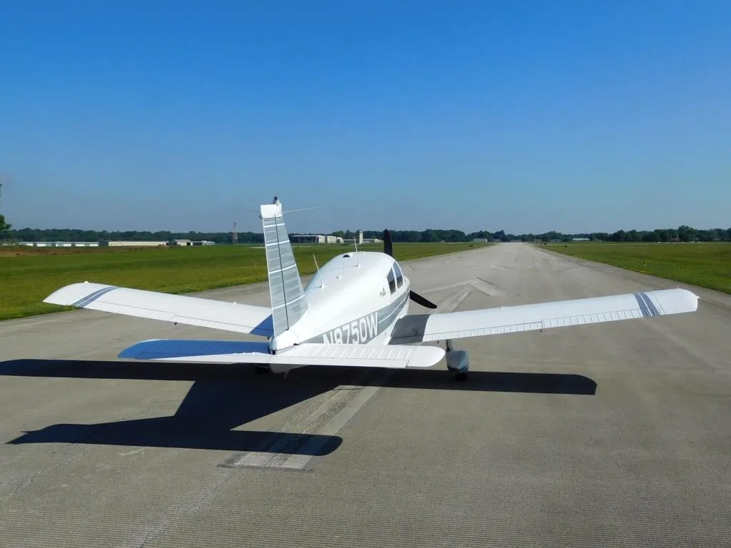 Exterior view of a 1964 Piper Cherokee 235 - N8750W Aircraft.