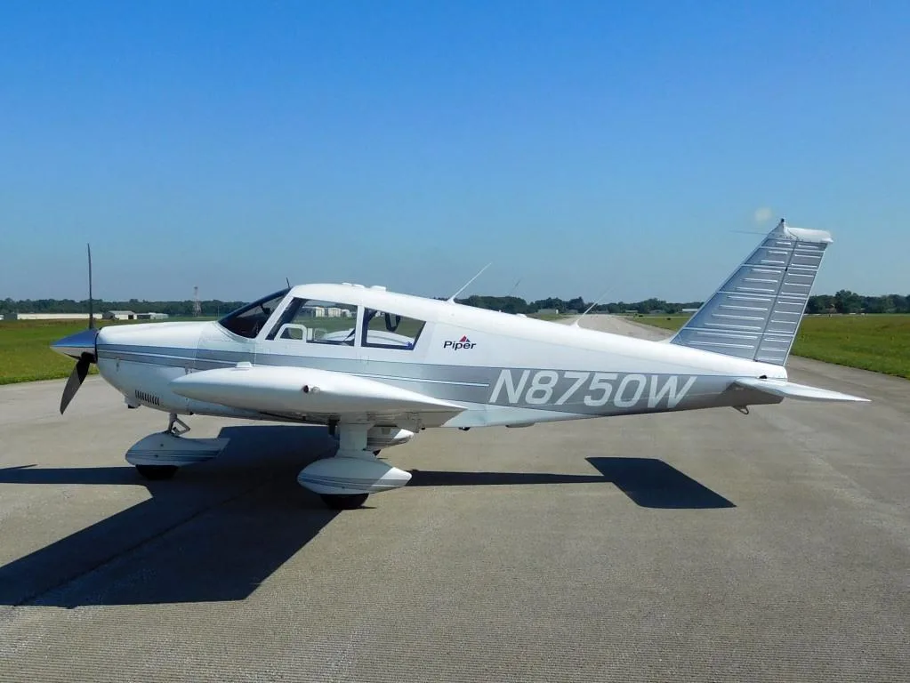 Exterior view of a 1964 Piper Cherokee 235 - N8750W Aircraft.