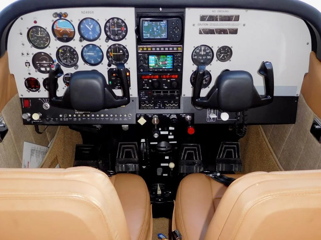 Cockpit and instrument panel of a 1965 Cessna 182 - N2493X Aircraft.