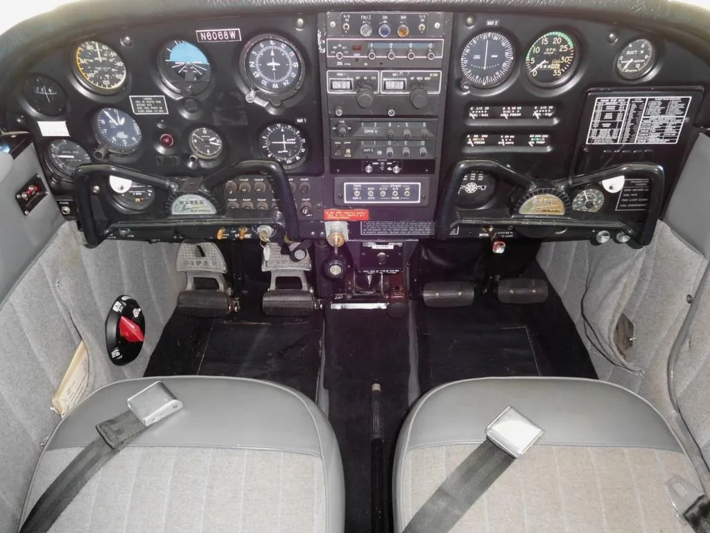 Cockpit and instrument panel of a 1965 Piper Cherokee 140 - N6068W Aircraft.