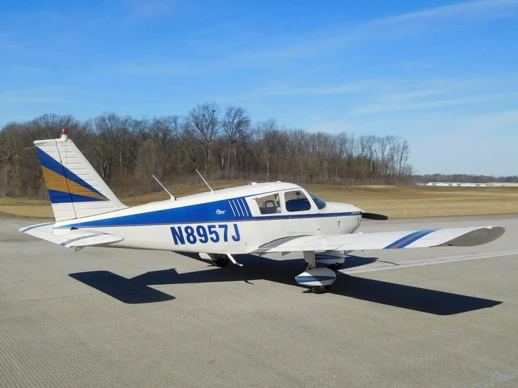 Exterior view of a 1965 Piper Cherokee 180 - N8957J Aircraft.