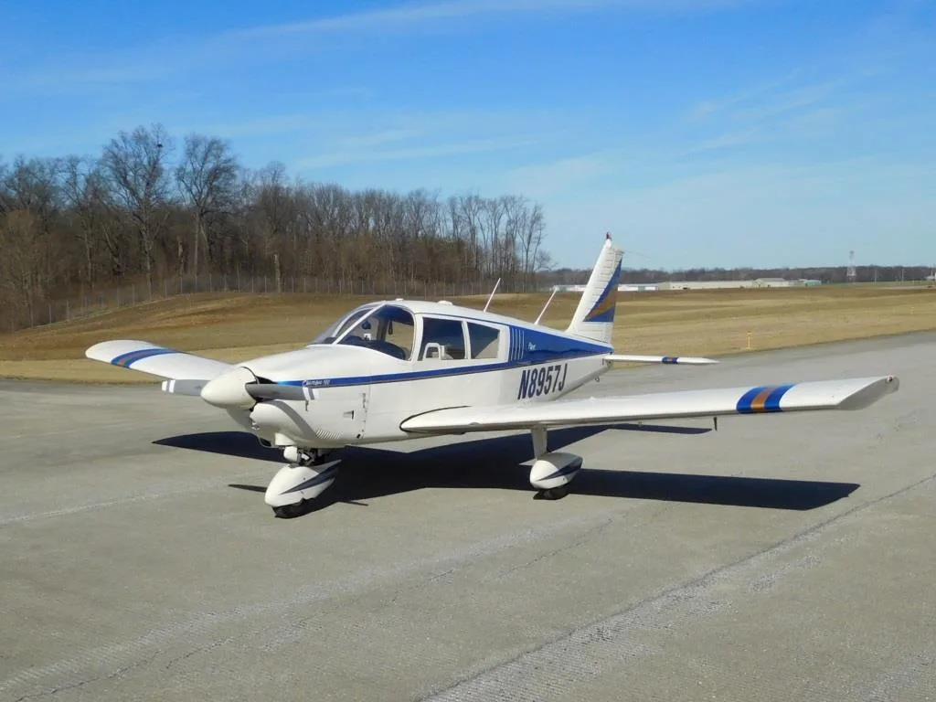 Exterior view of a 1965 Piper Cherokee 180 - N8957J Aircraft.