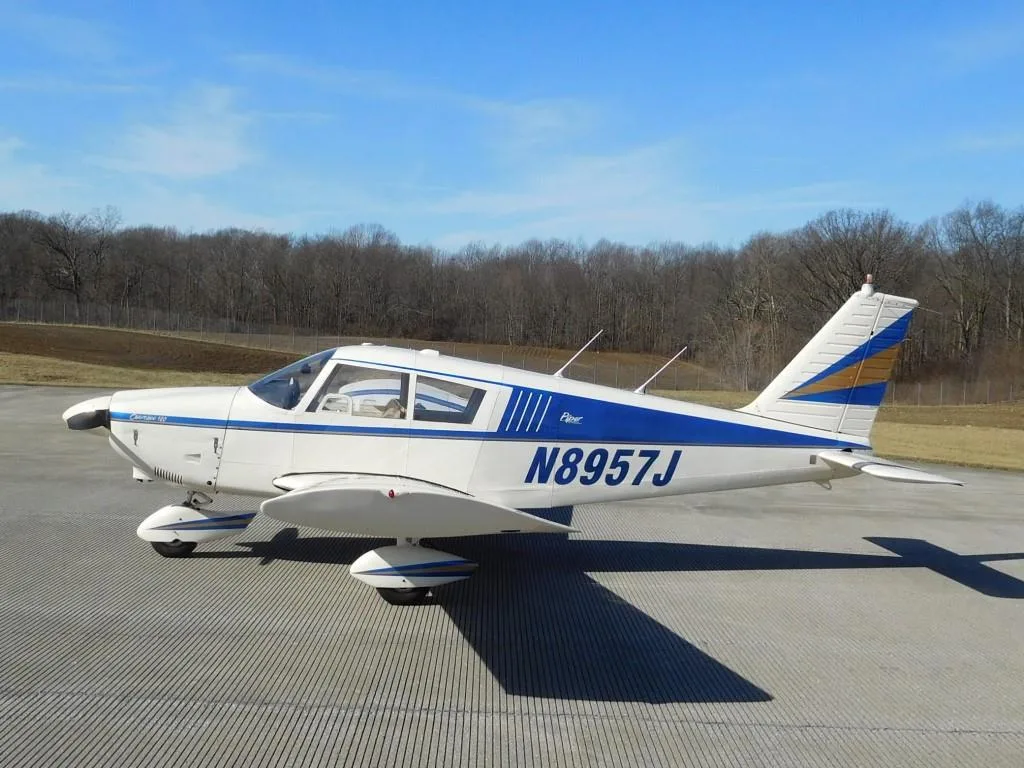 Exterior view of a 1965 Piper Cherokee 180 - N8957J Aircraft.