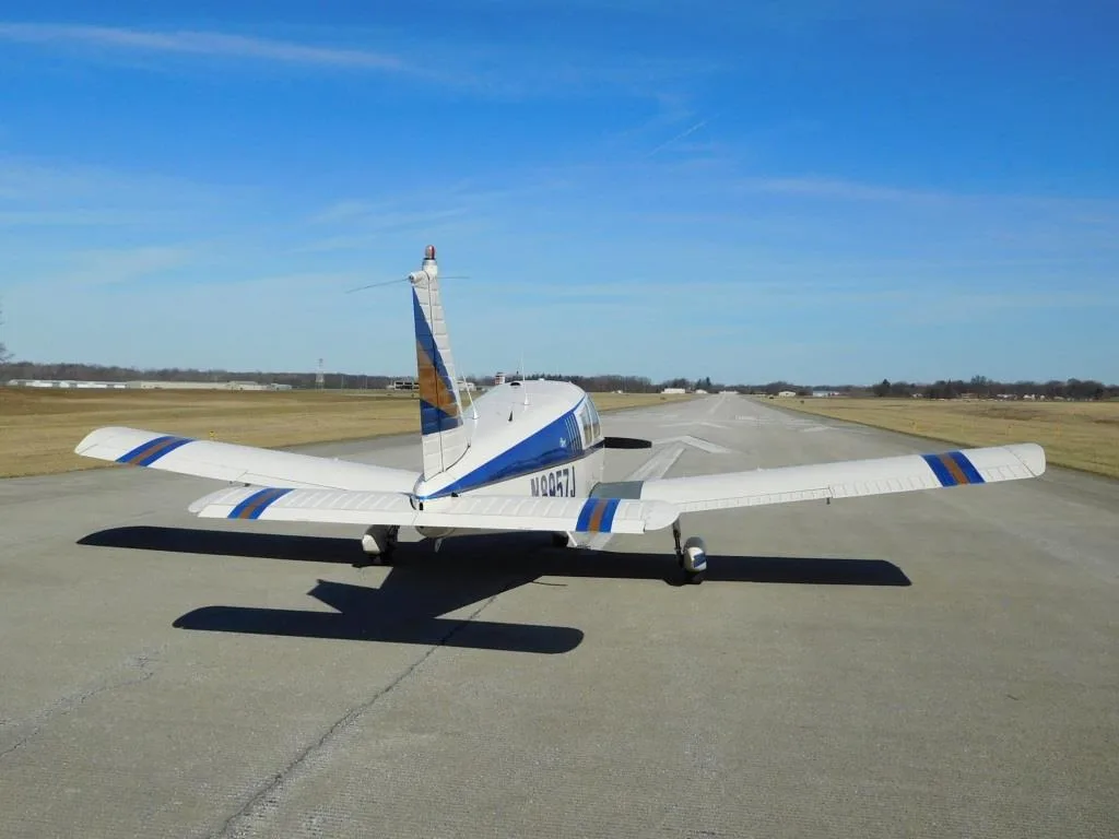 Exterior view of a 1965 Piper Cherokee 180 - N8957J Aircraft.