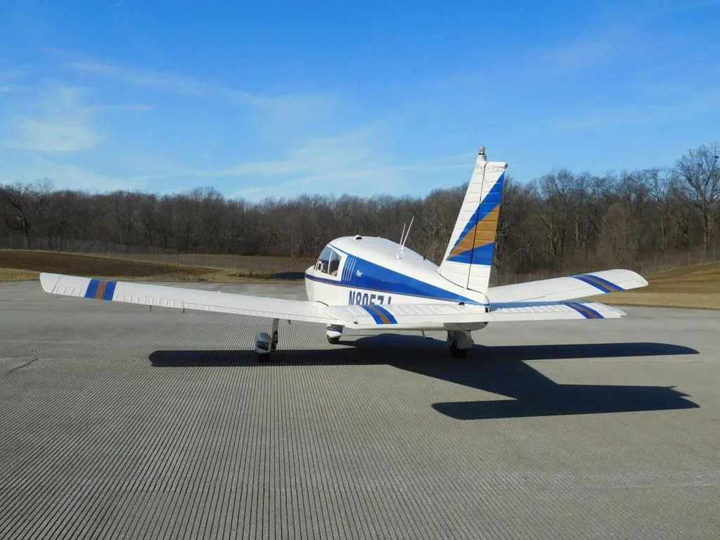 Exterior view of a 1965 Piper Cherokee 180 - N8957J Aircraft.
