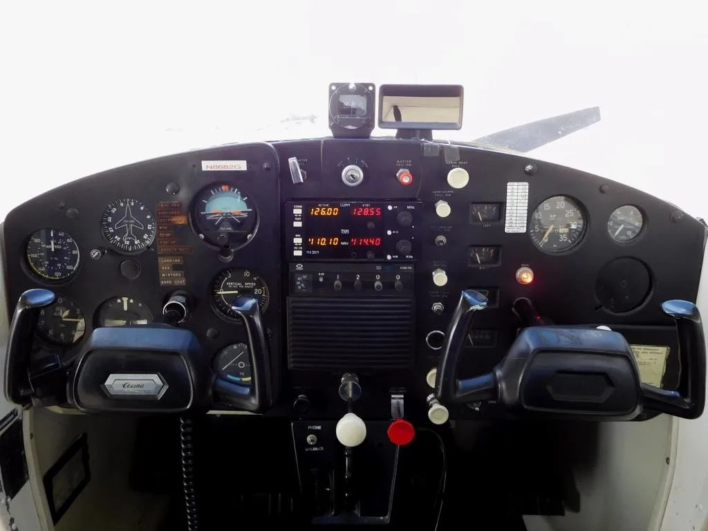 Cockpit and instrument panel of a 1966 Cessna 150- N8682G Aircraft.