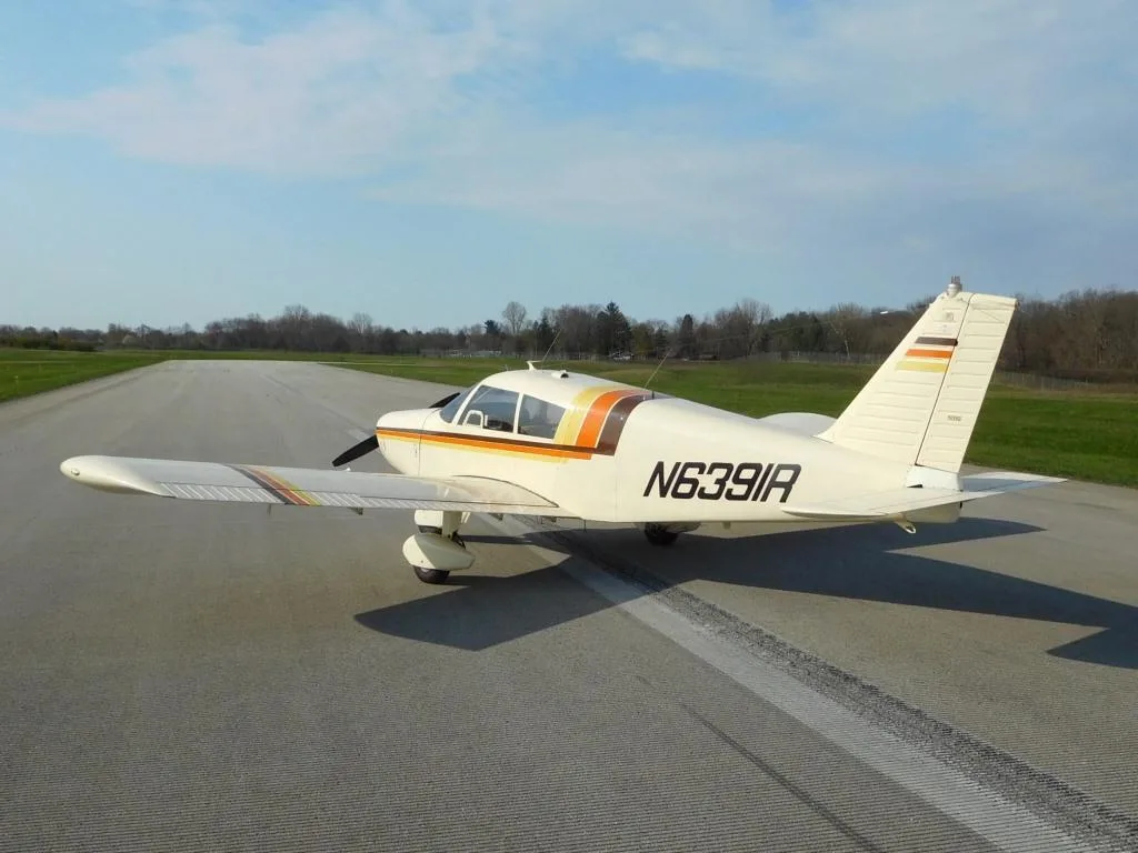 Exterior view of a 1966 Piper Cherokee 140- N6391R Aircraft.