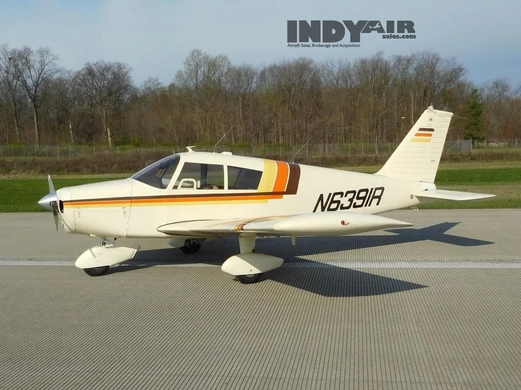 Exterior view of a 1966 Piper Cherokee 140- N6391R Aircraft.