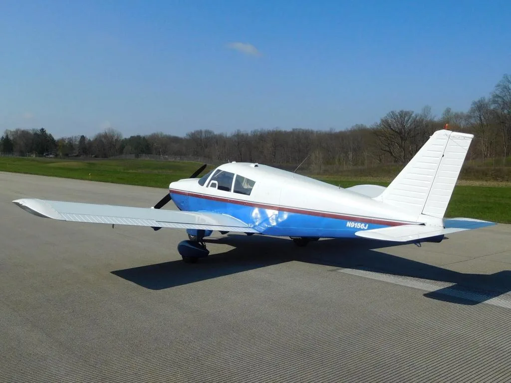 Exterior view of a 1966 Piper Cherokee 180 - N9156J Aircraft.